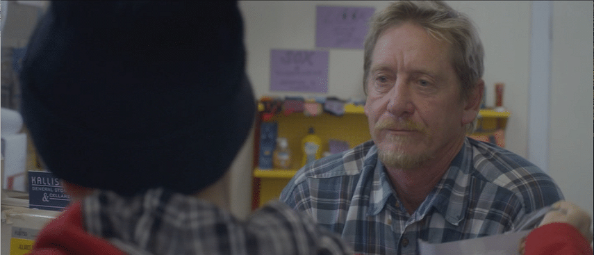 Ben Nagy reviews ‘Lost Gully Road’: Woman fleeing ex shacks up with a ghost in a cabin in the woods 4 The shopkeeper (John Plympton) helps Lucy out as she visits his store in "Lost Gully Road." (Screen capture from DVD by reviewer Ben Nagy).